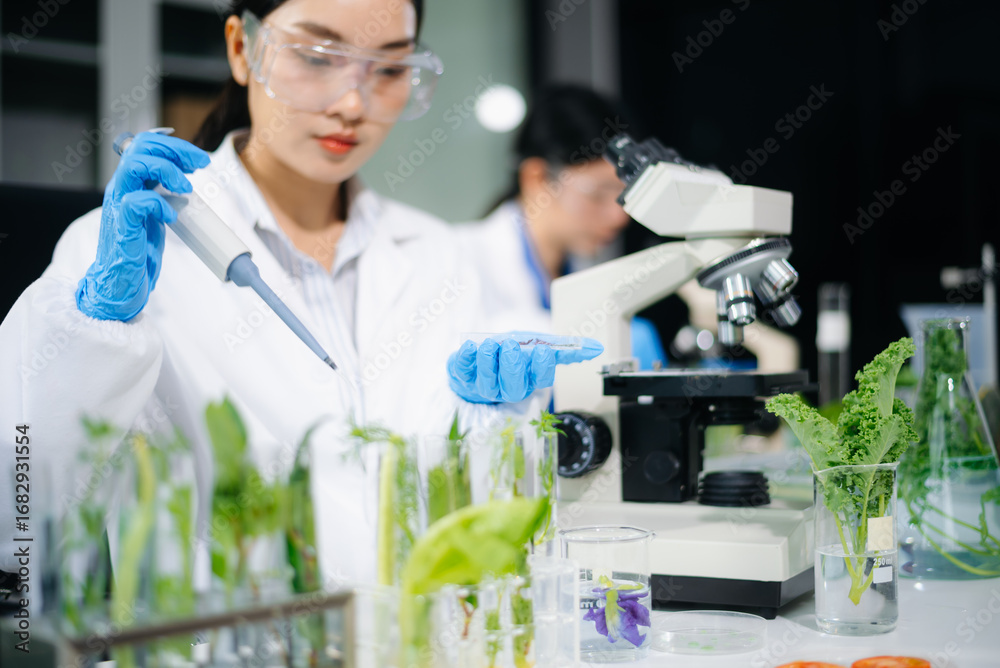 Fototapeta premium Scientist testing food samples in lab with microscope, vegetables, and meat for safety, nutrition, and biotechnology
