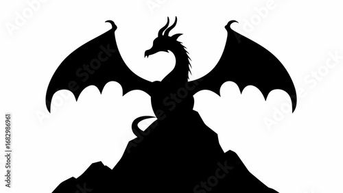 Silhouette of a dragon perched atop a mountain with wings spread against a white background view from below