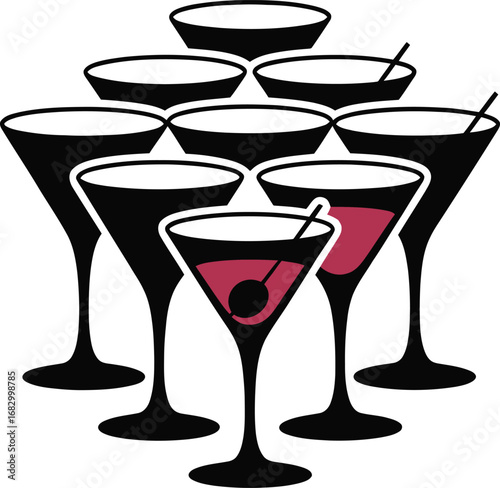 Arrangement of elegant martini glasses with red cocktails and cherries