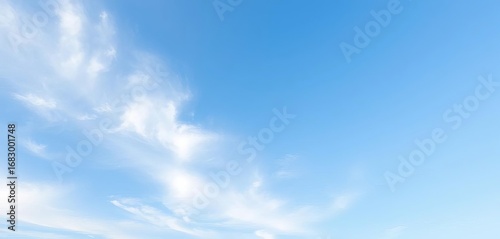 Fototapeta Naklejka Na Ścianę i Meble -  Serene sky blue background with subtle, soft cloud textures ,  heaven,  subtle