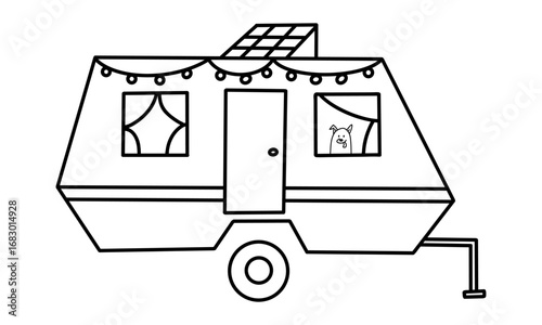 Dog in camper van parked in camping area. Solar panels on roof and funny dog inside mobile home. Travel trailer decorated with garlands.