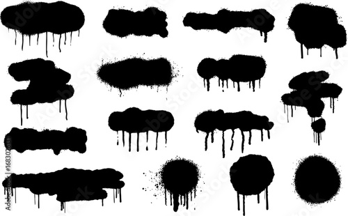 Collection of black spray paint splashes and drip shapes on transparent background. Grunge graffiti style elements perfect for street art, backgrounds, and urban design