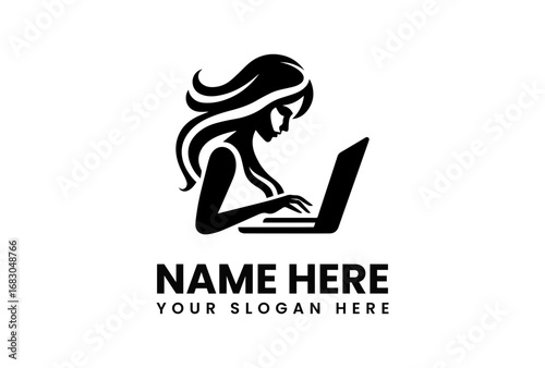 Focused Silhouette of a Woman Working on a Laptop.