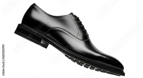 A single classic black leather oxford shoe with a sleek profile and a modern, thick lug sole.