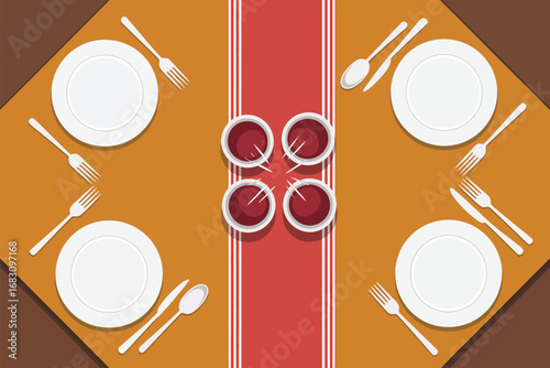 Overhead view of a table setting with plates cutlery and sauce dishes on a striped table runner