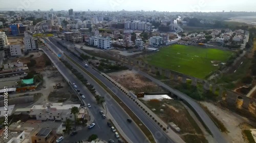 Aerial view of Larnaca, Cyprus. 
Morning traffic in the urban environment. Buildings, roads, cars and historical views.