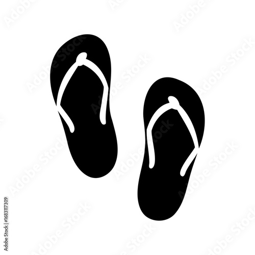 A pair of black and white flip flops for beach wear and relaxation