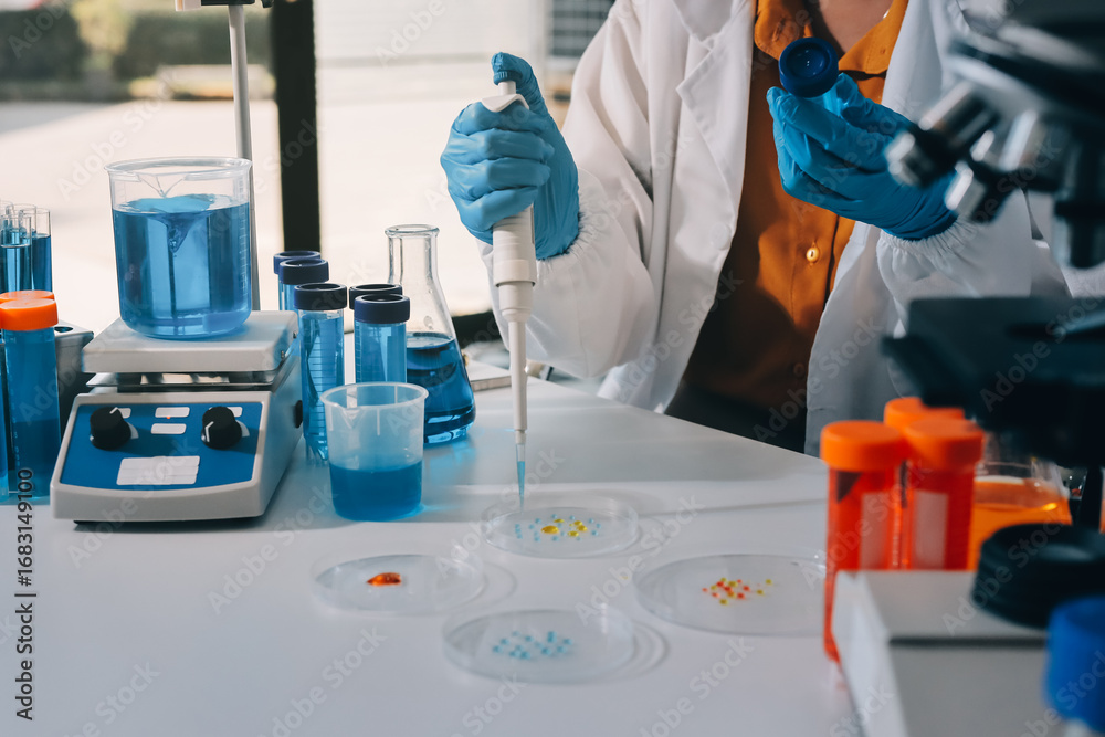 Fototapeta premium Collaboration, tablet or science with people in lab together for research or development. Innovation, tech and microscope with scientist team in clinical trial for planning or medical investigation