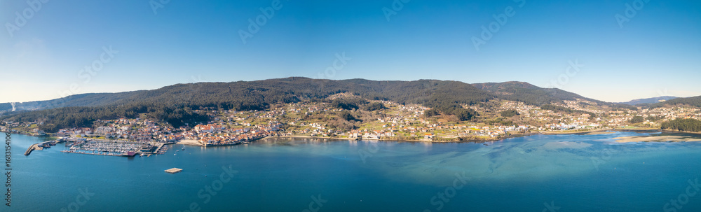Fototapeta premium Beautiful panoramic aerial view of combarro, famous tourist destination in , pontevedra, Spain. High quality photo