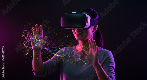 Woman using VR headset interacting with digital particles in virtual world