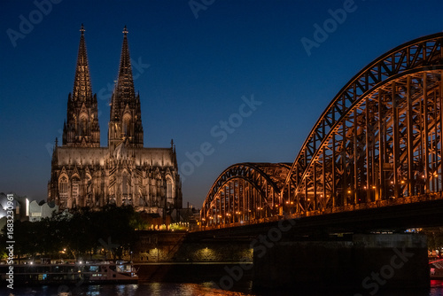 cologne cathedral and Hohenzollern bridge at night