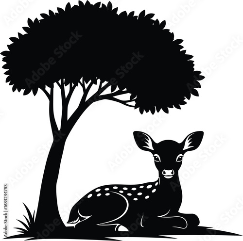 A serene deer resting under a tree, capturing peaceful essence of wildlife in its natural habitat