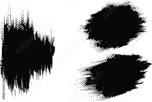 Three black blots are visible one upright  rectangular two rounded and clustered together