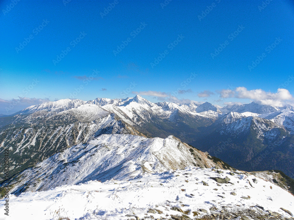mountains in winter on a clear day mountains in winter on a clear day