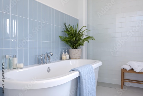Bathtub with a blue towel draped over it