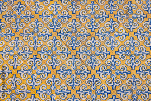 Patterned tiles on a wall in Valencia, Spain