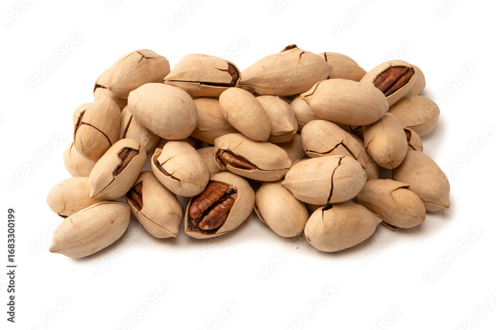 Obraz premium Pecan-nut in a shell isolated on white background. Top view.