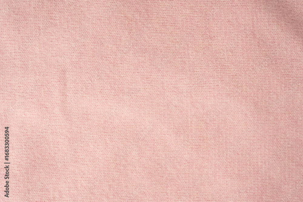 Fototapeta premium Soft pink cashmere sweater texture background.