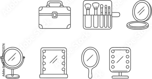 Collection of makeup and beauty accessories including mirrors and a vanity case