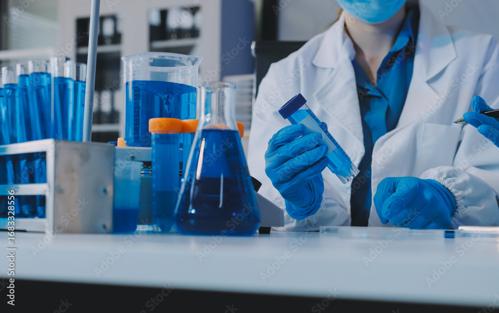 Fototapeta premium Collaboration, tablet or science with people in lab together for research or development. Innovation, tech and microscope with scientist team in clinical trial for planning or medical investigation