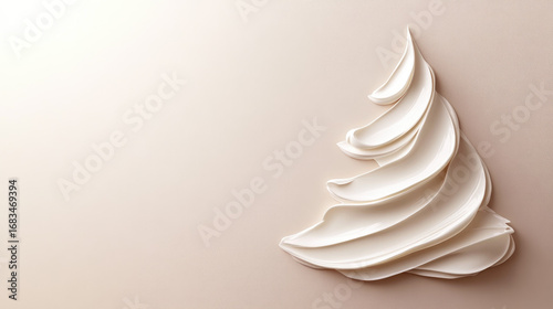 White moisturizing cream shaped as a christmas tree with a star on top, providing a festive and elegant skincare concept for the holiday season