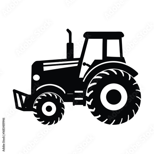 Black silhouette of a farm tractor with large rear wheels