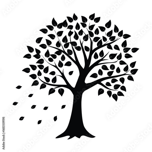 Black silhouette of a tree with leaves blowing in the wind