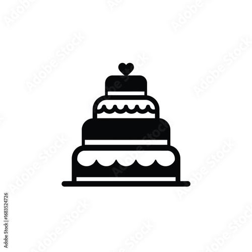 Black tiered cake with heart topper wedding celebration