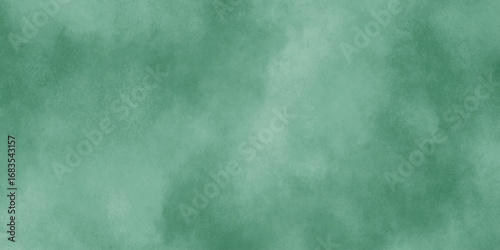Abstract Elegant dark green background with mottled vintage texture in old fancy background design, texture of colored parchment paper.	