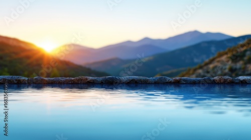 Serene Sunset Reflection Over Mountain Pool with Vibrant Sky and Calm Water