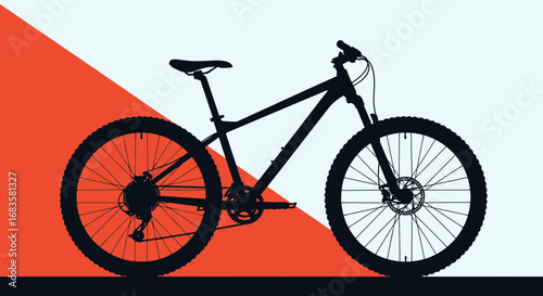 Silhouette of a mountain bike against a vibrant, geometric background with orange and white sections.