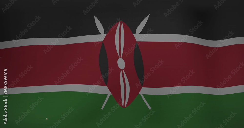 Fototapeta premium Displaying Kenyan national flag rippling in dark studio, with Maasai shield and crossed spears