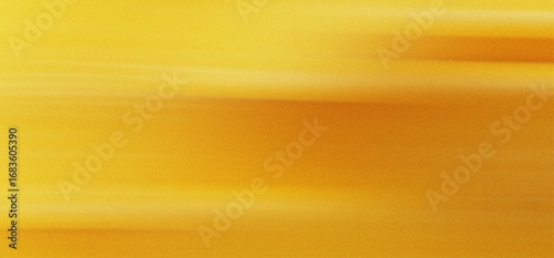 Golden yellow abstract background with horizontal motion blur and subtle texture image photo