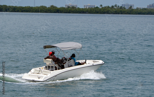 Motor Boat Outfitted With a Bimini Top