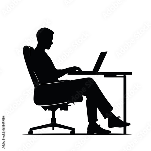 A person sits at a desk typing on a laptop, a silhouette of a businessman working
