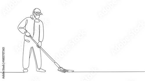 Worker in protective gear cleaning with a mop