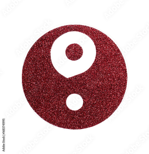 A circular, maroon-colored sticker or decal.  A white circle and dot are centered within it.  Sparkly texture