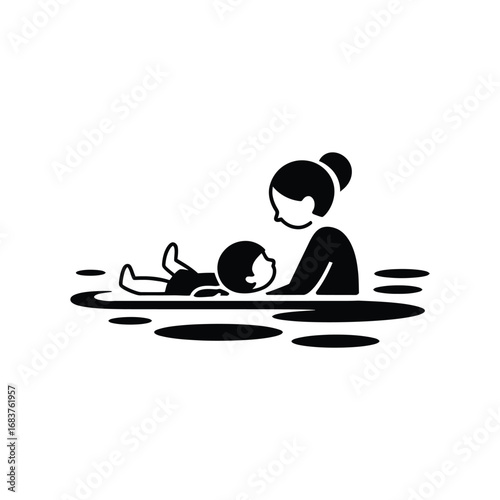 Parent and child enjoying swimming lessons together
