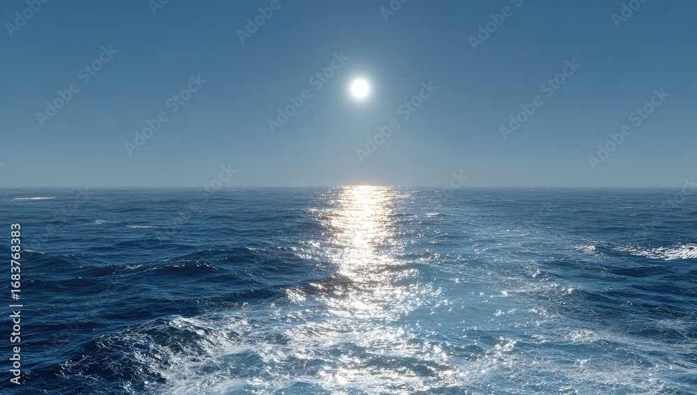 Fototapeta premium Vast ocean, sunlit horizon. Clear blue sky. Gentle waves