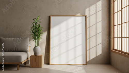 Calm living room interior featuring a poster frame above the sofa, with japandi balance, perfect for wall art showcase, refined detailing.