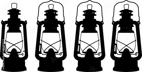 Four vintage kerosene oil lanterns arranged in a row silhouette
