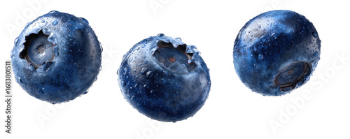 Panel kuchenny z motywem Three vibrant blueberries,?isolated on black background.?Each berry?shows a?slightly?depressed center?and?water droplets