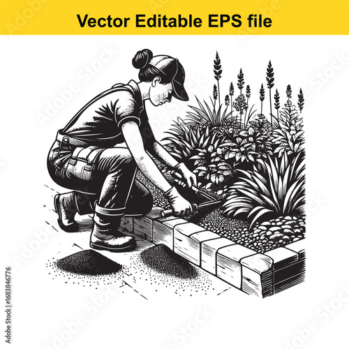 Gardener kneeling and planting flowers in a garden bed with stone border