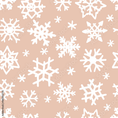 Vector seamless pattern with freehand drawn cartoon winter snowflakes snow made in kid childish style on beige background