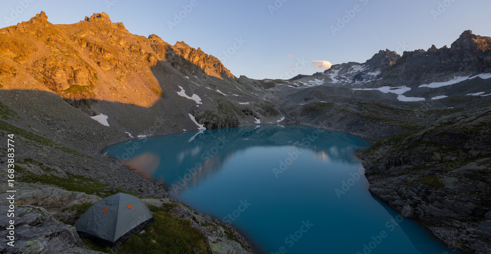 Obraz premium Alpine Lake Wildsee under the Pizol in the mountain range Glarus Alps - Canton of St. Gallen, Switzerland