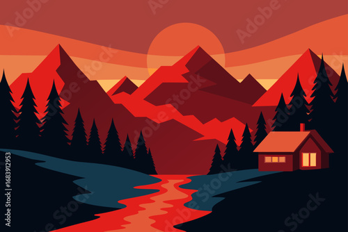 Winter sunset over snow-covered mountains with a cloudy sky and distant fog