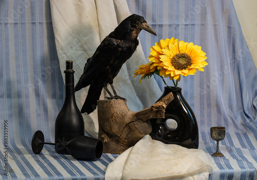 still life with a crow and a black bottle