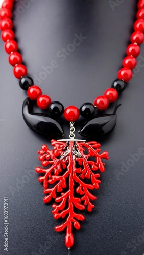 Red and black beaded necklace with coral pendant (1)