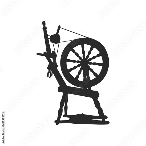 Silhouette of a vintage spinning wheel on white background