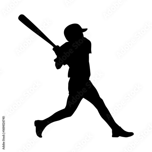 Baseball player swinging bat in silhouette